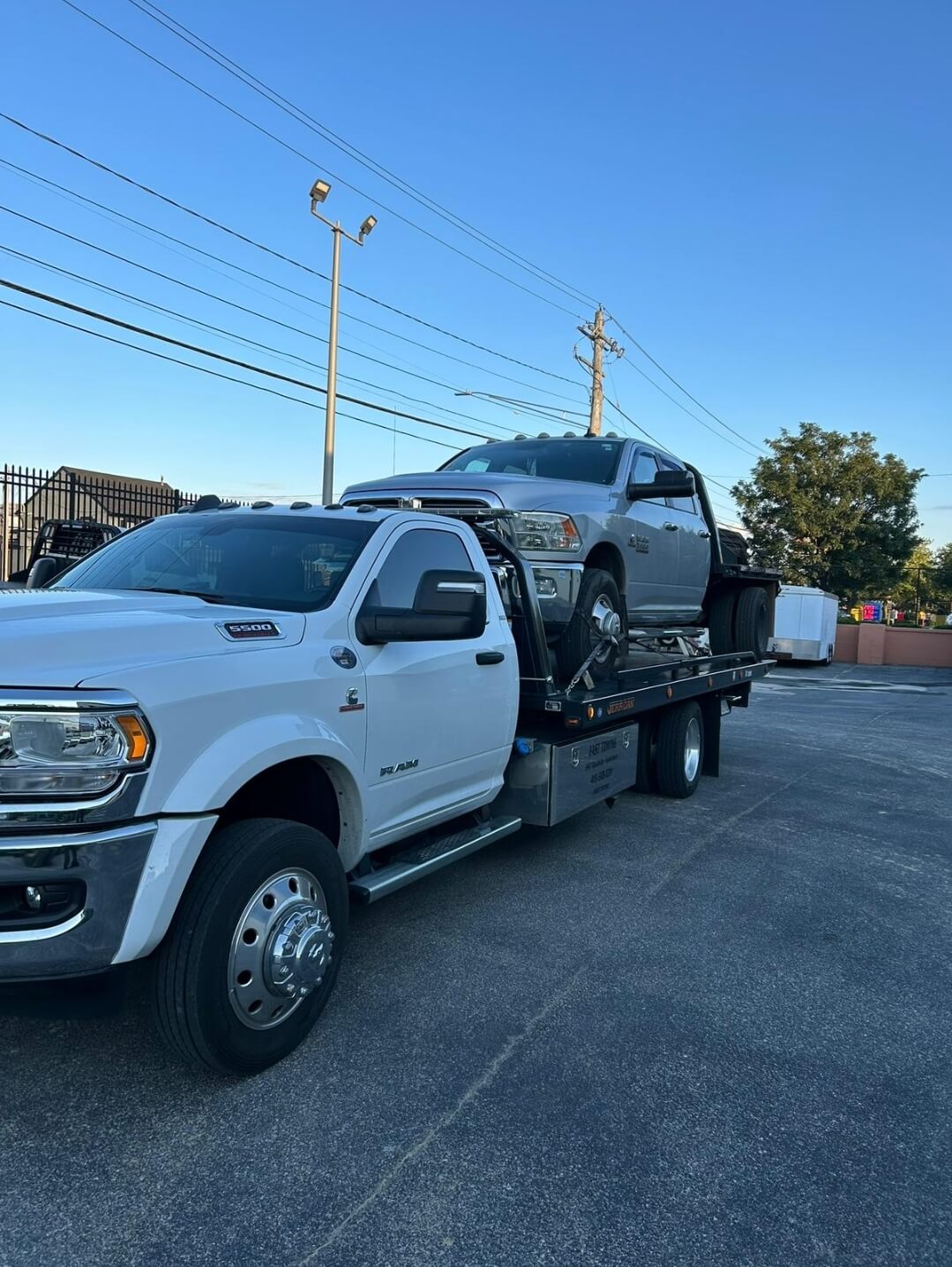 Towing a pickup on highway shoulder